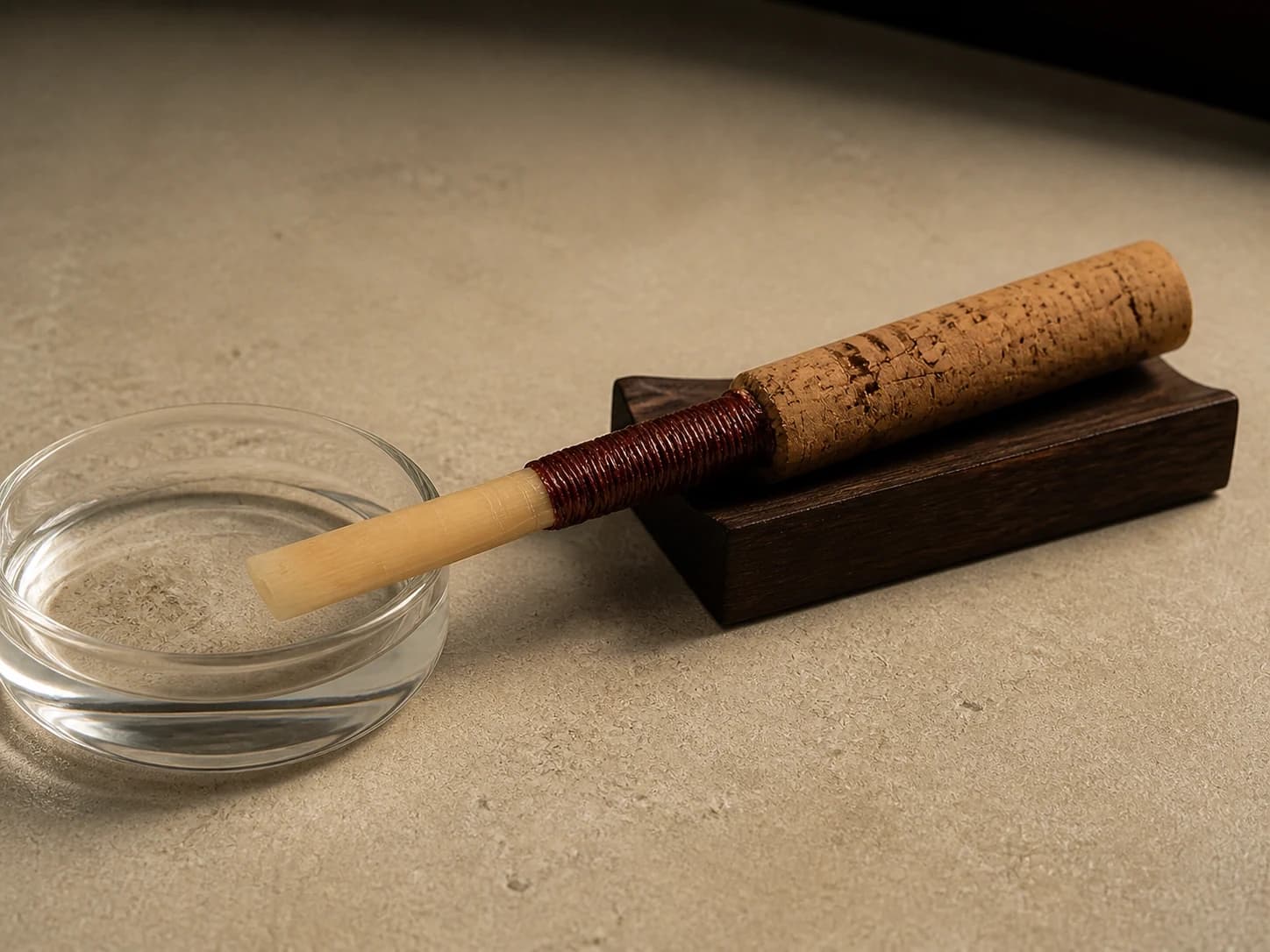 Handmade oboe reed with only its cane tip prepared in clean water